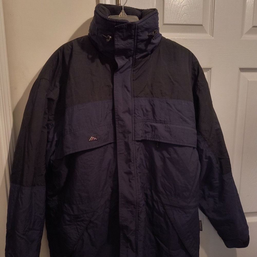 Snowridge Navy Blue/Black Stand Collar, Zip Hook, and Loop Pockets Lined Jacket.